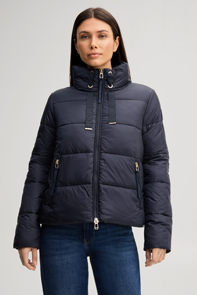 Leads to product detail page "Quilted jacket with a stand-up collar in navy"