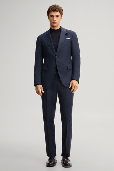 Leads to product detail page "Navy wool-blend suit"