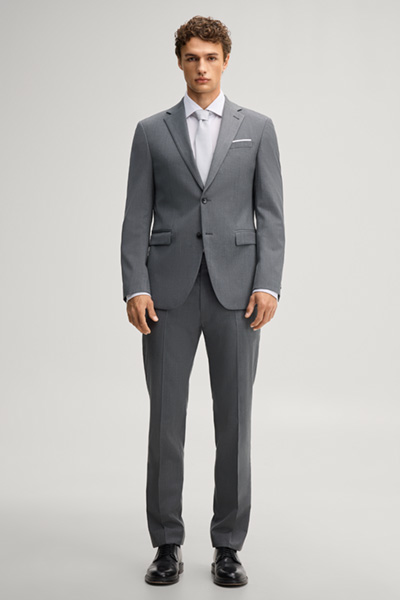Leads to product detail page "Anthracite-coloured wool-blend suit"