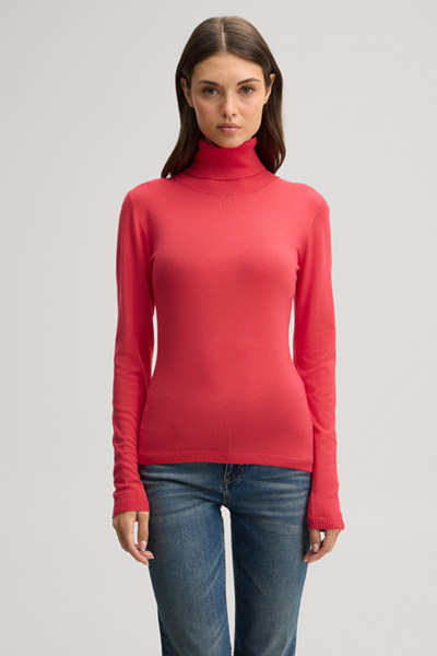 Leads to product detail page "Pink viscose roll-neck jumper"