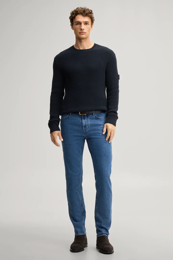Leads to product detail page "Dark blue structured cotton crew-neck jumper"