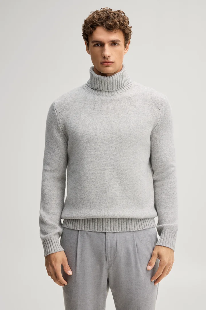 Leads to product detail page "Light grey woollen turtleneck jumper"