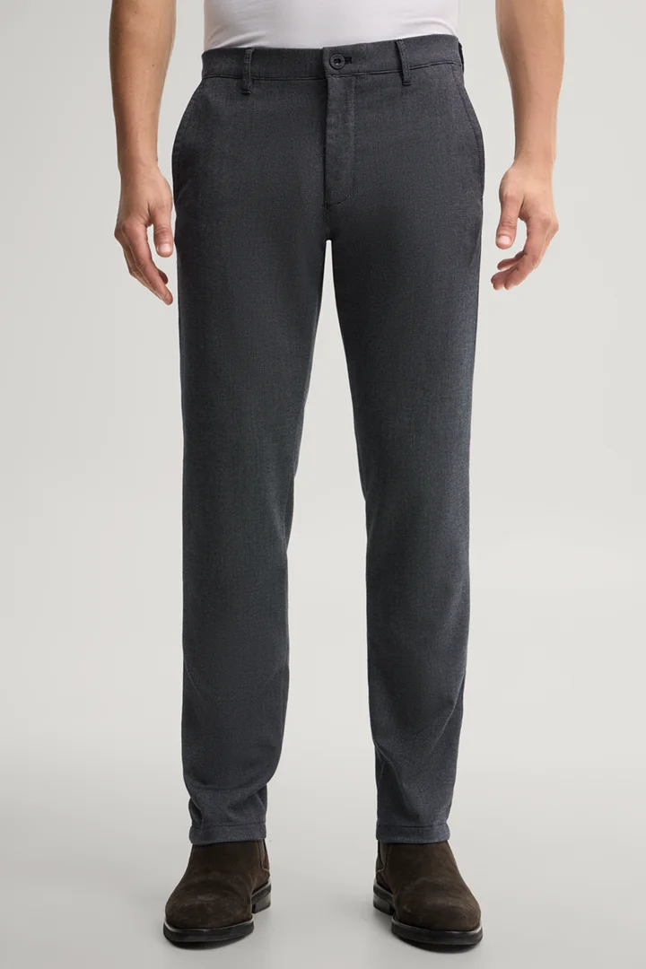 Leads to product detail page "Patterned navy chinos"