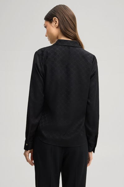 Leads to product detail page "Black cornflower-print shirt"
