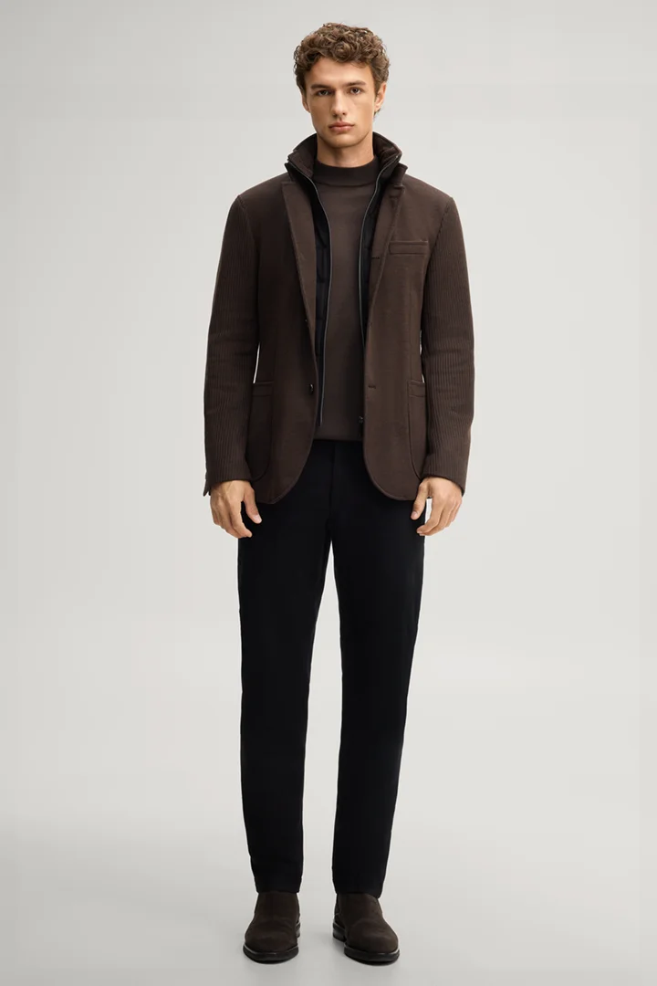 Leads to product detail page "Dark brown suit jacket with a stand-up collar"