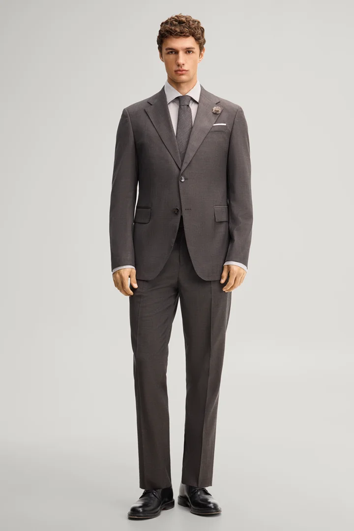 Leads to product detail page "Dark brown wool-blend suit"