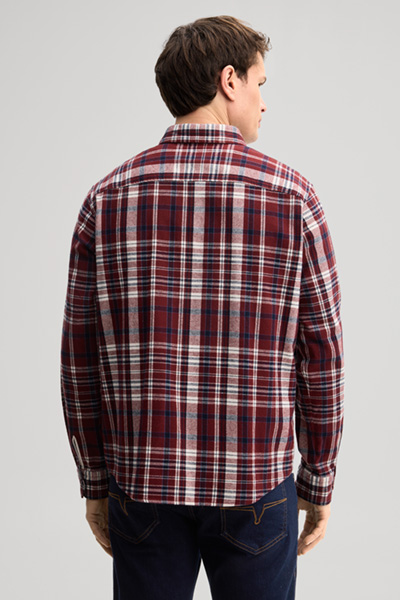 Leads to product detail page "Casual cotton shirt in a red checked pattern"