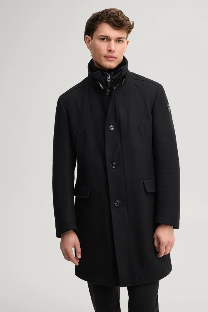 Leads to product detail page "Black wool-blend coat"