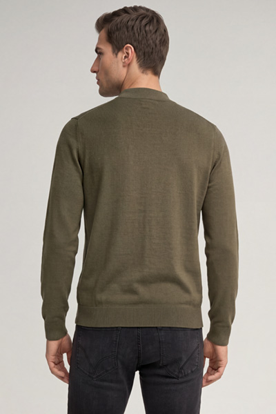 Leads to product detail page "Dark green virgin wool crew-neck jumper"