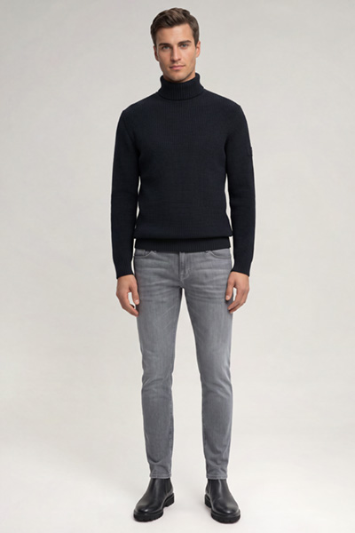 Leads to product detail page "Dark blue roll-neck jumper"