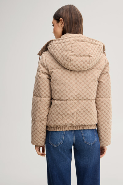 Leads to product detail page "Cornflower jacquard quilted jacket with a camel and dark brown pattern"