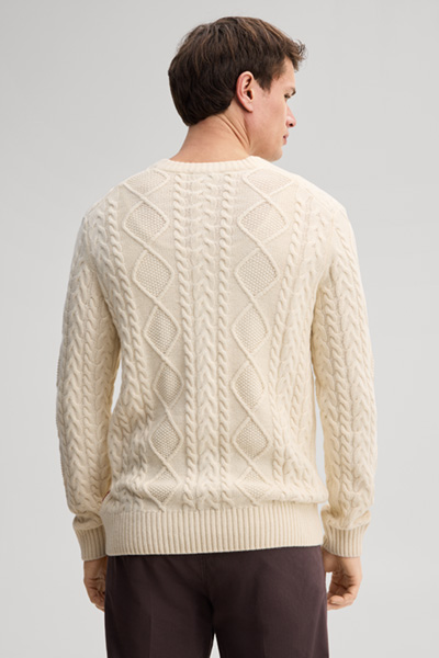Leads to product detail page "Beige crew-neck jumper"