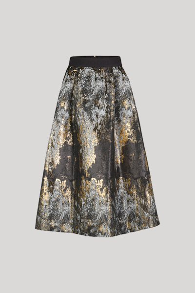 Leads to product detail page "Midi skirt in black, gold and silver pattern"