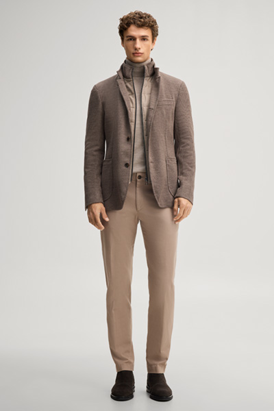 Leads to product detail page "Light brown suit jacket with a stand-up collar"