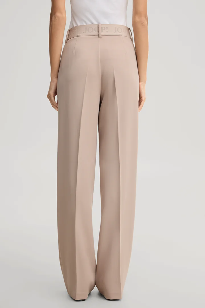 Leads to product detail page "Travel marlene trousers in beige"