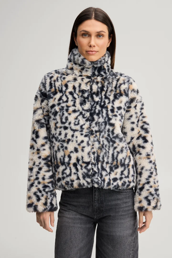 Leads to product detail page "Faux fur jacket with a stand-up collar in a beige and black pattern"