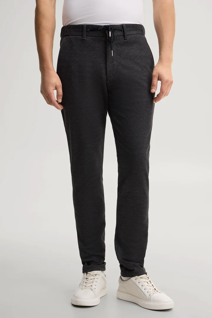 Leads to product detail page "Navy viscose-blend chinos"