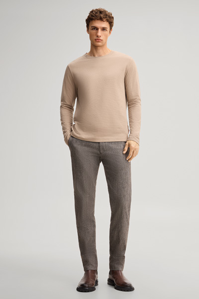 Leads to product detail page "Brown cotton longsleeve top"