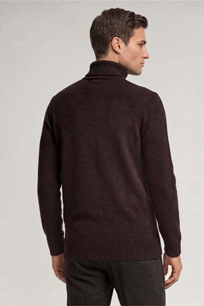 Leads to product detail page "Dark brown woollen turtleneck jumper"
