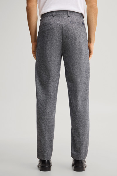 Leads to product detail page "Navy silk-blend pleated trousers"