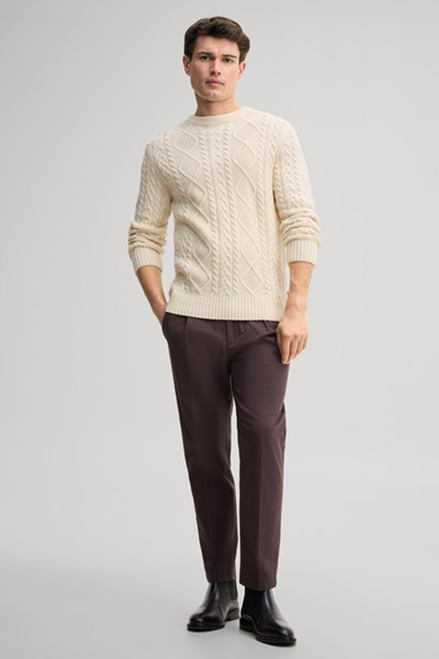 Leads to product detail page "Beige crew-neck jumper"