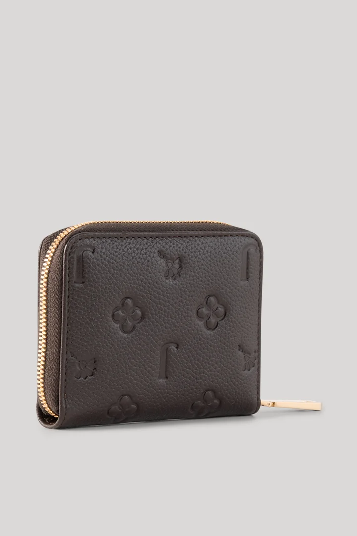 Leads to product detail page "Dark brown patterned purse"