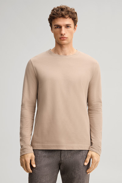 Leads to product detail page "Brown cotton longsleeve top"