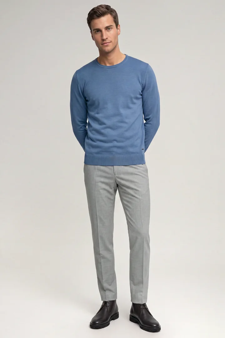 Leads to product detail page "Medium blue virgin wool jumper"