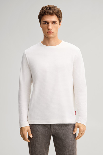 Leads to product detail page "Beige cotton longsleeve top"