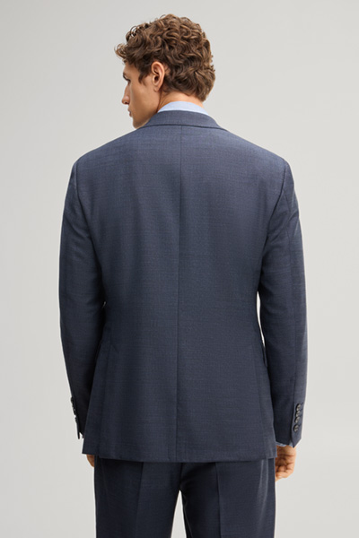 Leads to product detail page "Modular suit jacket in navy, made from virgin wool"