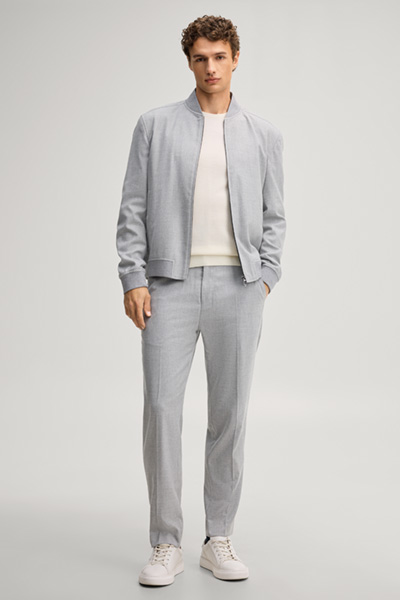 Leads to product detail page "Light grey suit trousers"