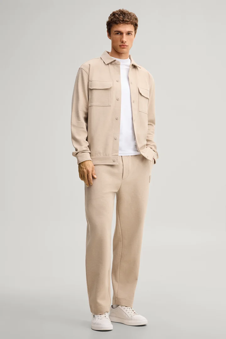 Leads to product detail page "Brown overshirt"