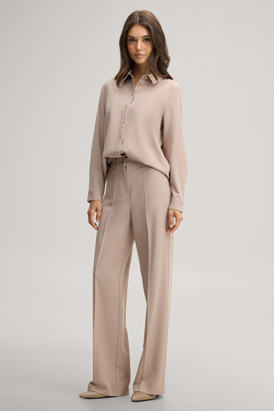 Leads to product detail page "Travel marlene trousers in beige"