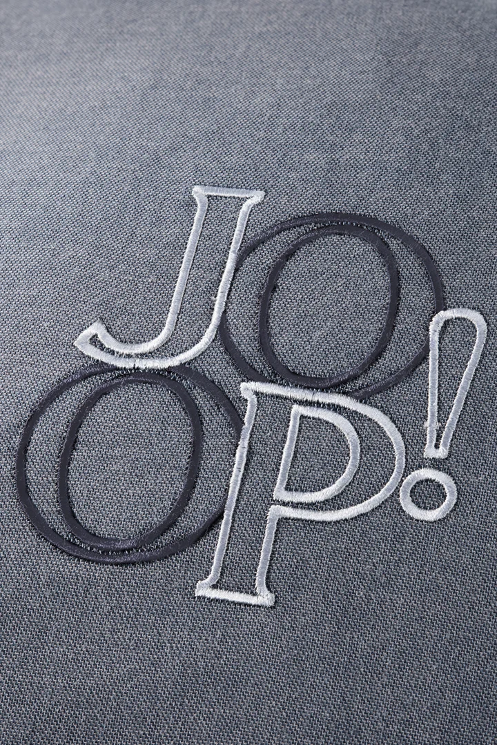 Leads to product detail page "JOOP! soft label cushion in blue, 35 x 35 cm"