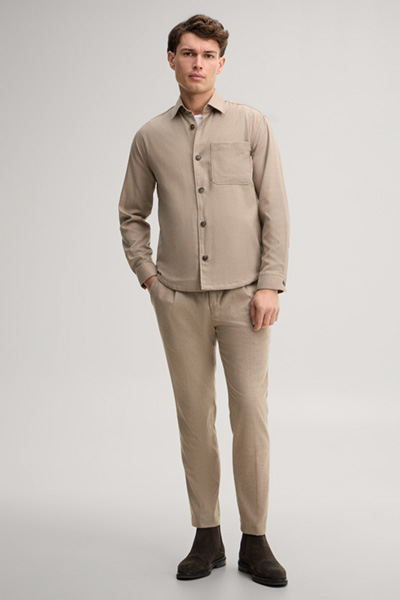 Führt zu Produktdetailseite „Bundfaltenhose in Beige"