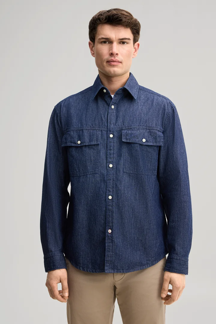 Leads to product detail page "Dark blue denim shirt"