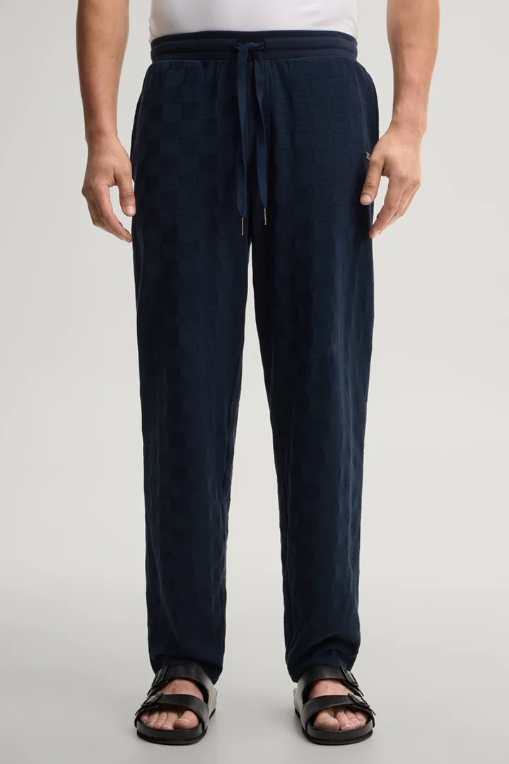 Leads to product detail page "Dark blue loungewear trousers"