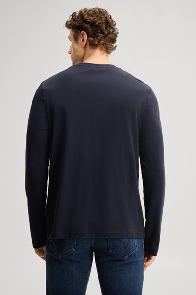 Leads to product detail page "Navy cotton longsleeve top"