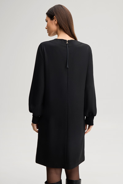Leads to product detail page "Black dress"