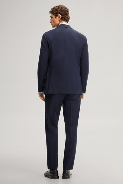 Leads to product detail page "Navy wool-blend suit"