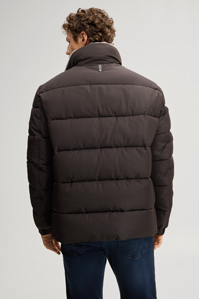 Leads to product detail page "Quilted jacket with a lined stand-up collar in dark brown"