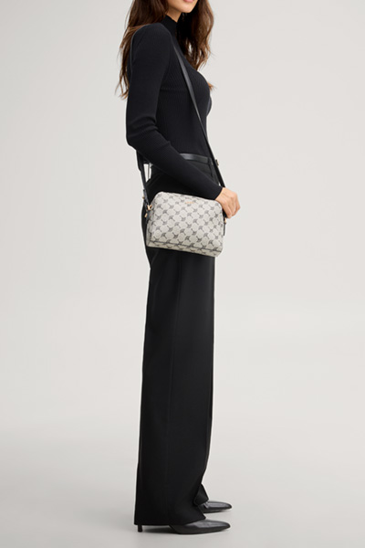 Leads to product detail page "Mazzolino Cloe cornflower shoulder bag in black patterned"