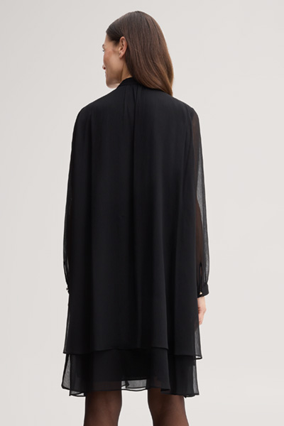 Leads to product detail page "Black chiffon dress with a bow tie"
