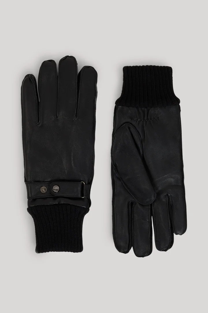 Führt zu Produktdetailseite „Handschuhe in Schwarz"