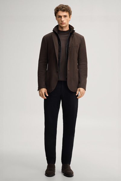 Leads to product detail page "Dark brown suit jacket with a stand-up collar"