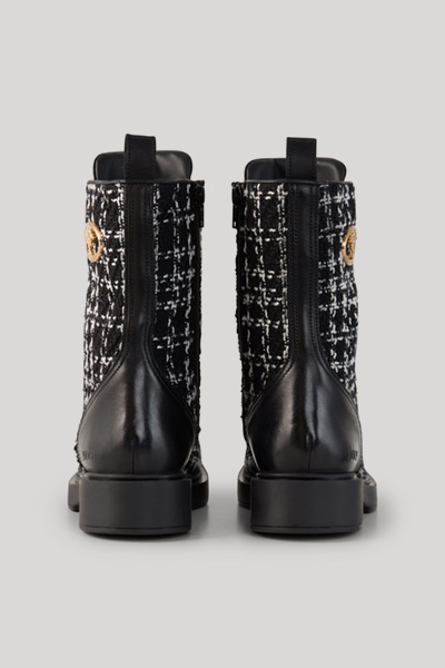 Leads to product detail page "Milano mia lace-up boots in black"