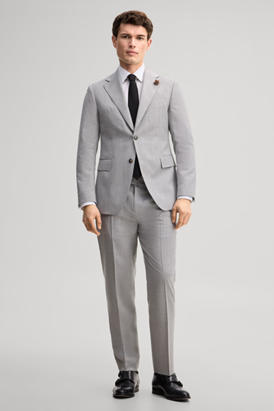 Leads to product detail page "Modular suit jacket in grey, made from virgin wool"