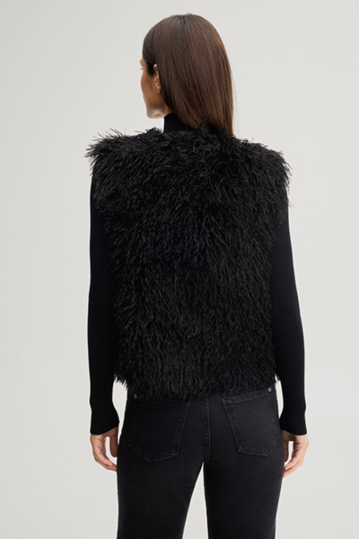 Leads to product detail page "Black faux fur waistcoat"