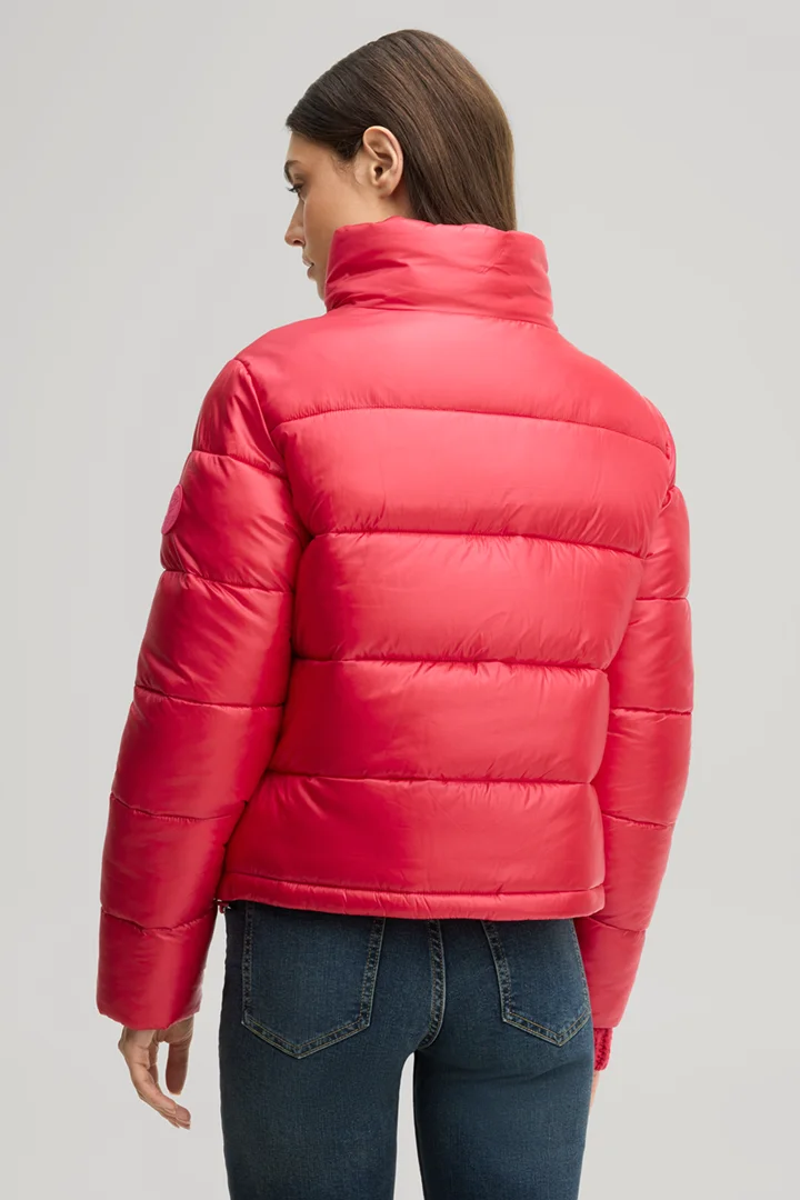 Führt zu Produktdetailseite „Steppjacke mit Stehkragen in Pink"