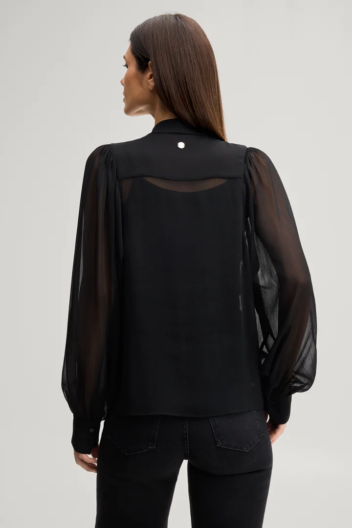 Leads to product detail page "Black chiffon bow tie blouse"